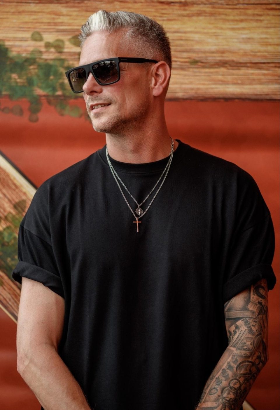 Portrait of DJ Dimaro wearing sunglasses and a black T-shirt