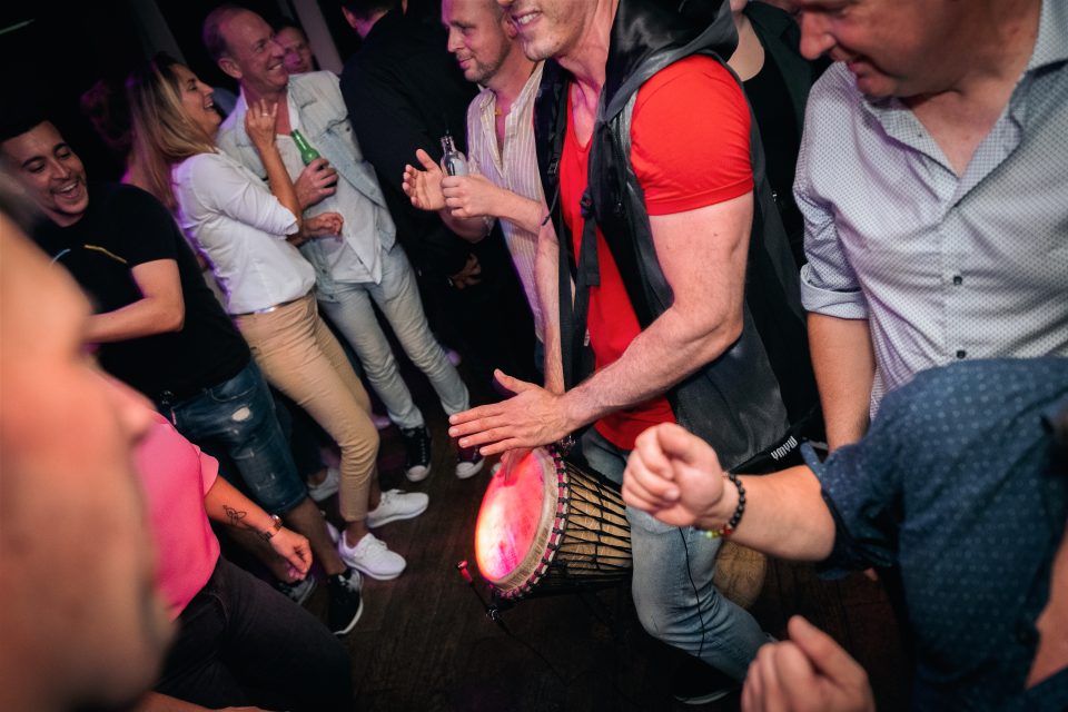 Sam Anderson playing live percussion at Mojo