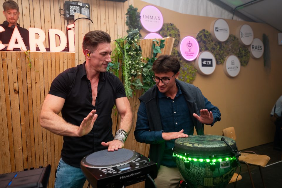 Sam Anderson playing live percussion at The Night